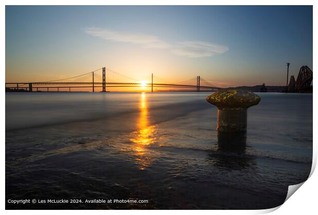 The forth Road Bridges at sunset from the shore at the rail bridge Print by Les McLuckie