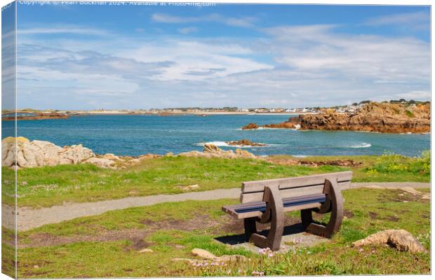 Bench with a Coastal View Guernsey Canvas Print by Pearl Bucknall