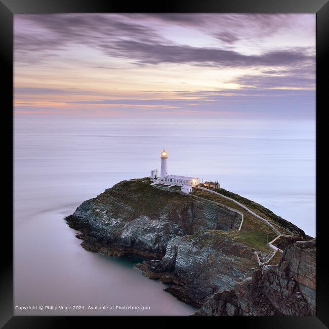 South Stack Lighthouse at Sunset. Framed Print by Philip Veale