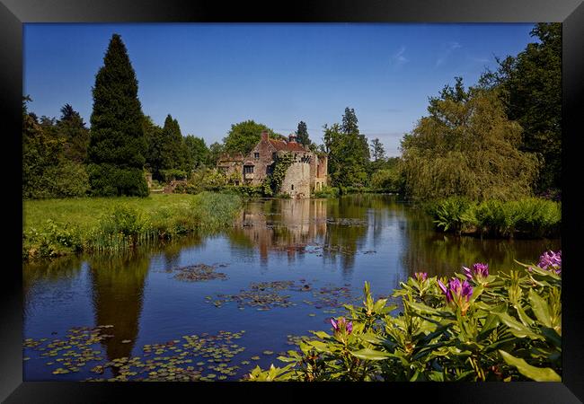 Reflections of the folly in the moat of Old Scotney Castle Lamberhurst Kent UK Framed Print by John Gilham