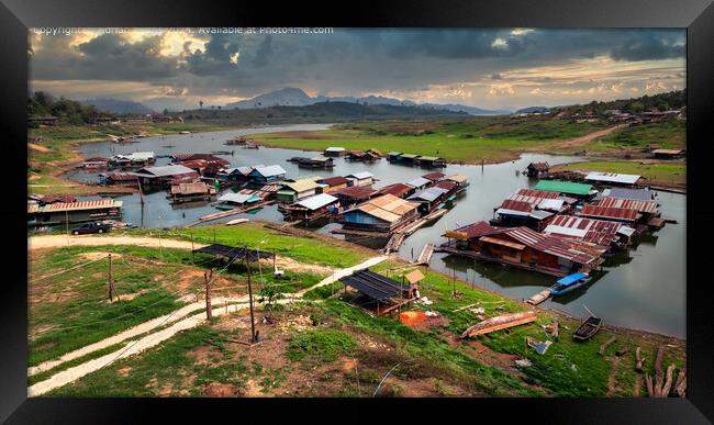 Mon Refugees Floating Village Thailand  Framed Print by Adrian Evans