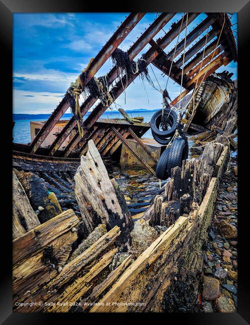 Rusty Shipwreck Scotland Framed Print by Sally Ryall