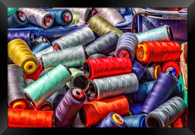 Colourful Cotton Bobbins Framed Print by Kevin Hellon