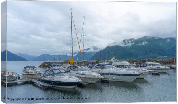 Boats and Mountains at Sognefjord, Norway Canvas Print by Maggie Bajada