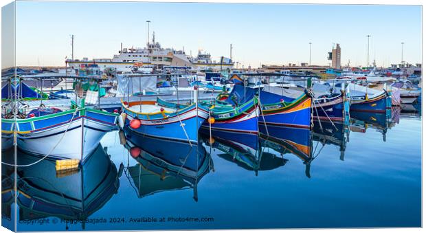 Colorful Boats with Reflection at Mgarr Harbour, Gozo, Malta.  Canvas Print by Maggie Bajada
