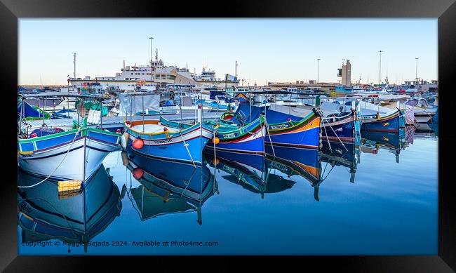 Colorful Boats with Reflection at Mgarr Harbour, Gozo, Malta.  Framed Print by Maggie Bajada
