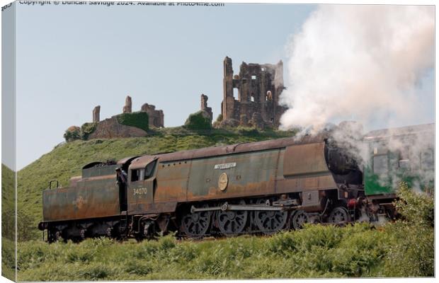 Rustic 34070 Manston steam train below Corfe Castle on the Swange Railway Canvas Print by Duncan Savidge