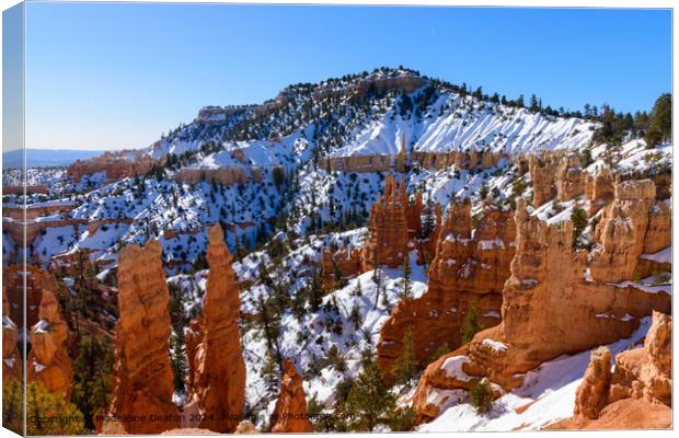 Bryce Canyon Snowy Cliffs Canvas Print by Madeleine Deaton