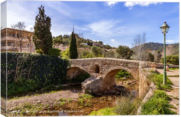 Roman Bridge of Pollenca, Mallorca Canvas Print by Jim Monk