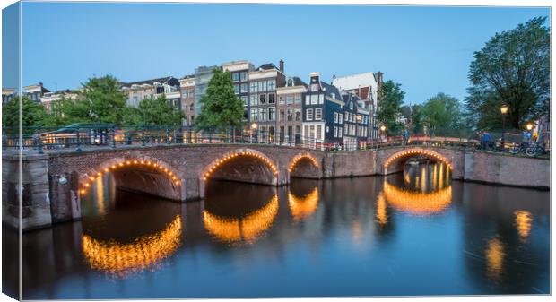 Keizersgracht and Reguliersgracht intersections at blue hour Canvas Print by Jason Wells
