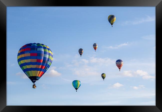 Colourful Hot Air Balloon Ascending Framed Print by J Biggadike