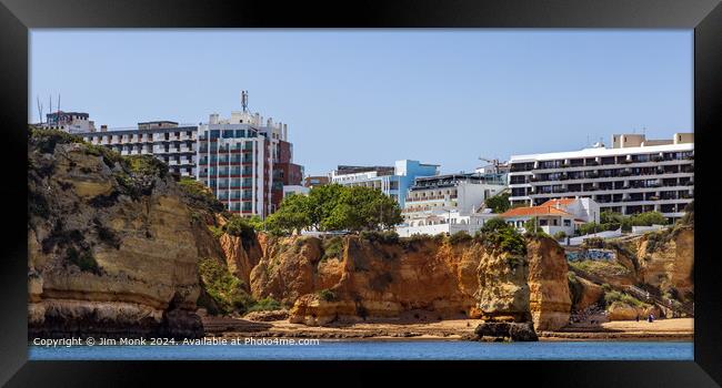 Praia Dona Ana from the sea Framed Print by Jim Monk
