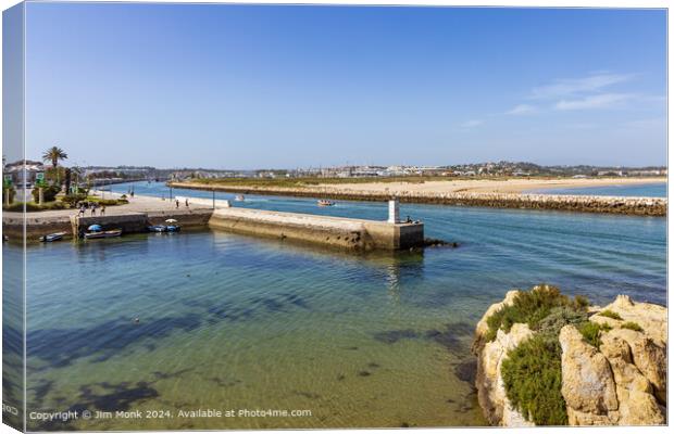 Lagos marina entrance Algarve Canvas Print by Jim Monk