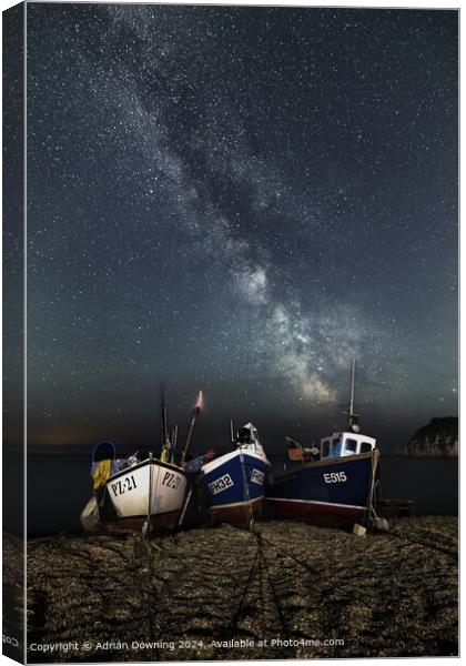 Fishing Boats under the Milky Way on Devon beach Canvas Print by Adrian Downing