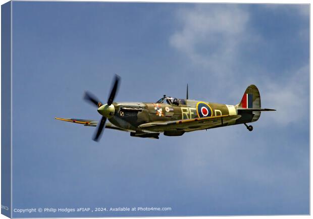Spitfire Flying Cloudy Sky Canvas Print by Philip Hodges aFIAP ,