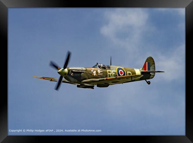 Spitfire Flying Cloudy Sky Framed Print by Philip Hodges aFIAP ,