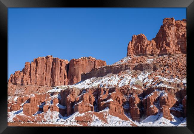 Snow-covered Desert Rock Formation Framed Print by Madeleine Deaton