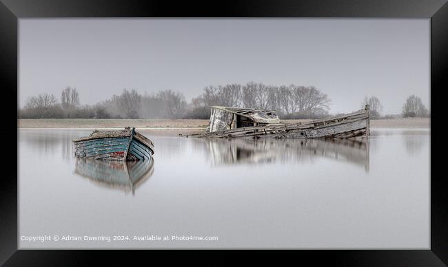Surreal Mist, Tranquil Water, Derelict Boats Framed Print by Adrian Downing