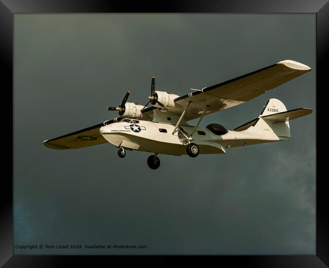 Contrasting Light Aeroplane Landing Framed Print by Tom Lloyd