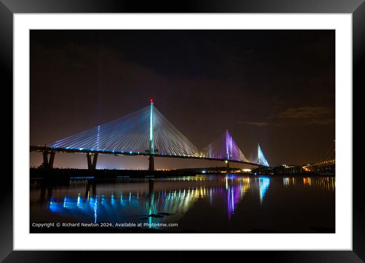 Queensferry Crossing Bridge Illuminated at night Framed Mounted Print by Richard Newton
