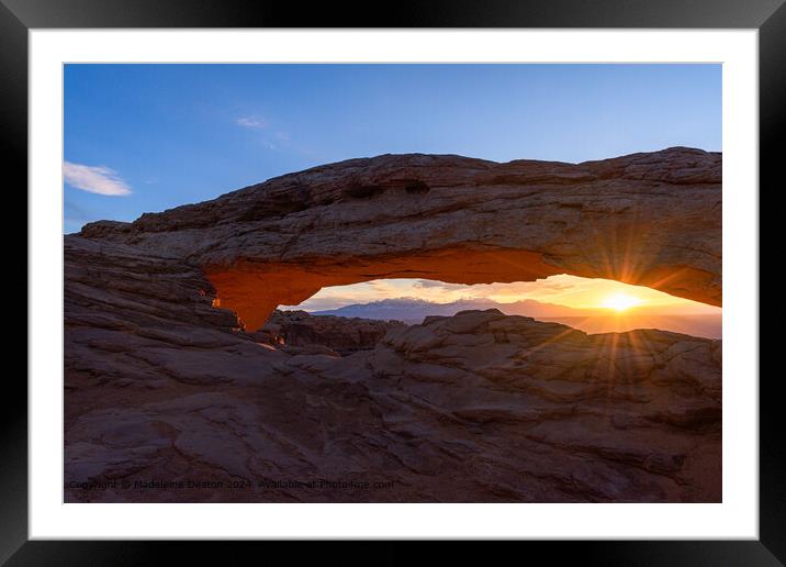Warm Sunrise at Mesa Arch in Canyonlands National Park with Sun Flare Framed Mounted Print by Madeleine Deaton