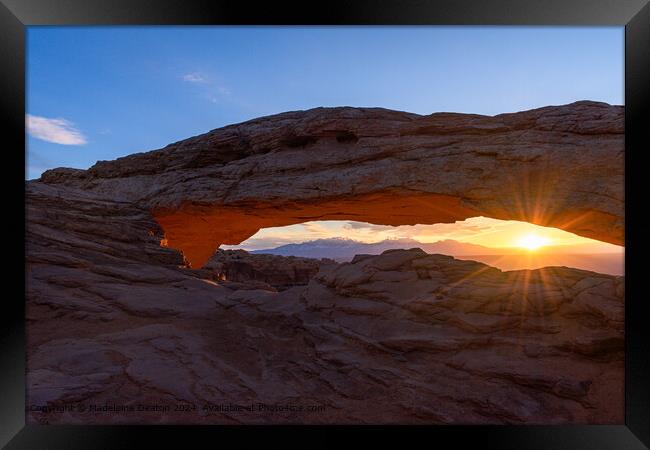 Warm Sunrise at Mesa Arch in Canyonlands National Park with Sun Flare Framed Print by Madeleine Deaton