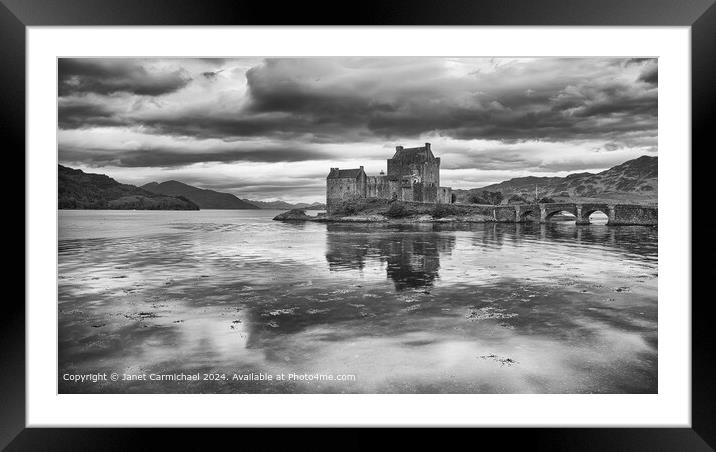Storms Build over Eilean Donan Castle Framed Mounted Print by Janet Carmichael