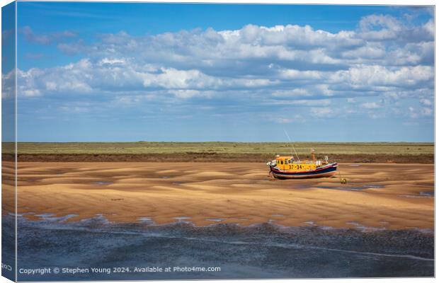 Wells Next To The Sea Boat on Sand Canvas Print by Stephen Young