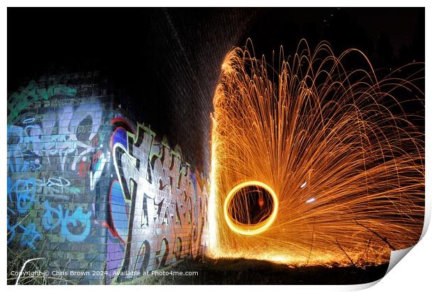 Graffiti illuminated by fire Print by Chris Brown