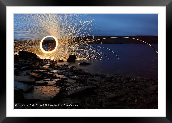 Sparks fly into the night Framed Mounted Print by Chris Brown