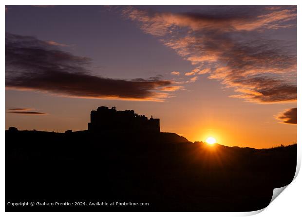 Bamburgh Castle Sunset Silhouette at Sunset Print by Graham Prentice