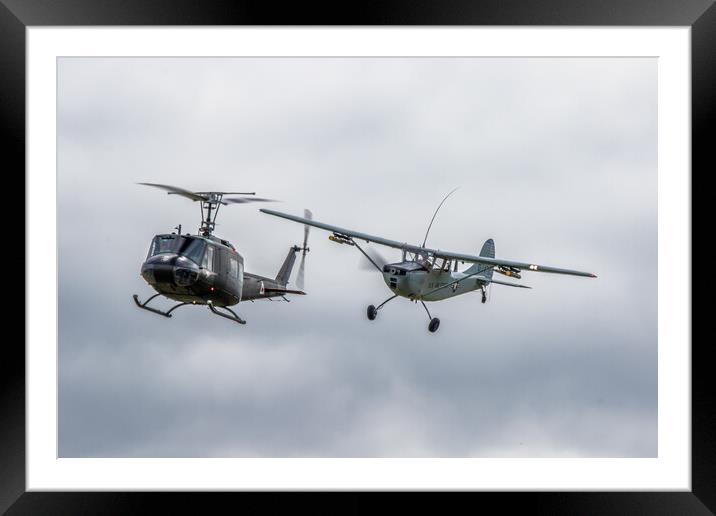 Cessna O-1 Bird Dog and Bell UH-1 Huey Helicopter Framed Mounted Print by J Biggadike