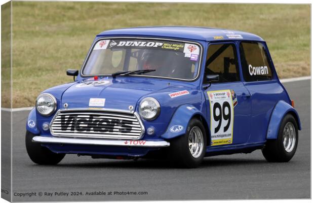 Blue Mini Racing on Track Canvas Print by Ray Putley