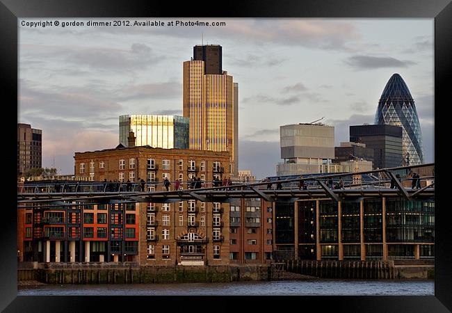The city of London in the early evening sun Framed Print by Gordon Dimmer