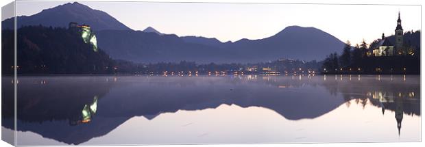 Dawn breaks over Lake Bled Canvas Print by Ian Middleton