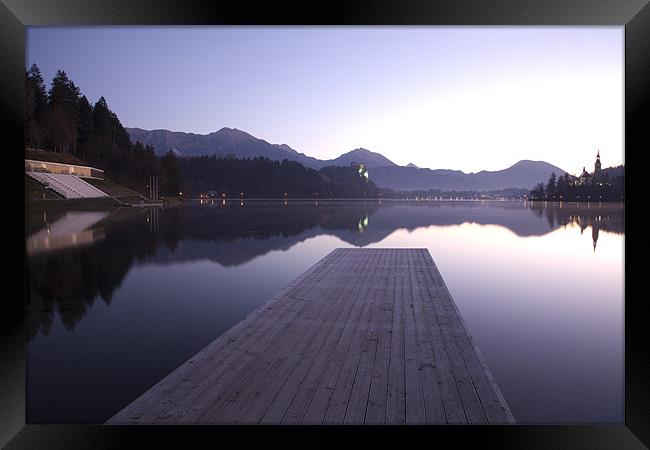 Dawn breaks over Lake Bled Framed Print by Ian Middleton