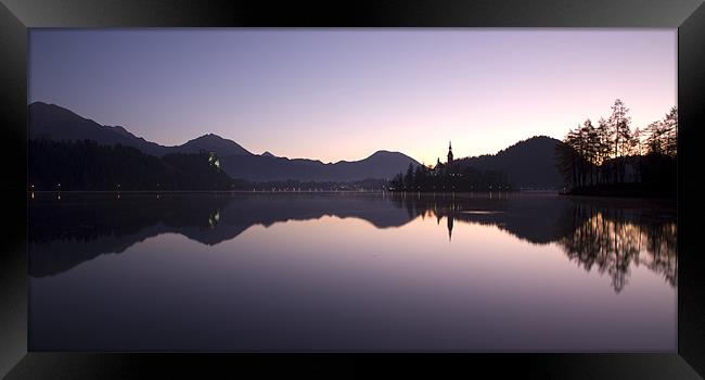 Dawn breaks over Lake Bled Framed Print by Ian Middleton
