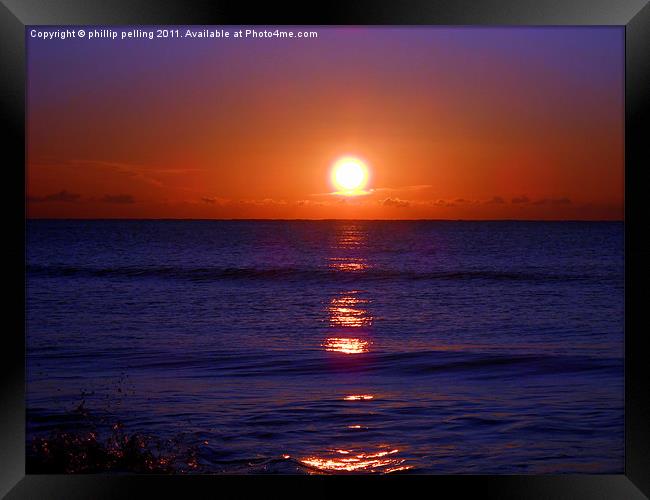 Sunrise on the ocean Framed Print by camera man