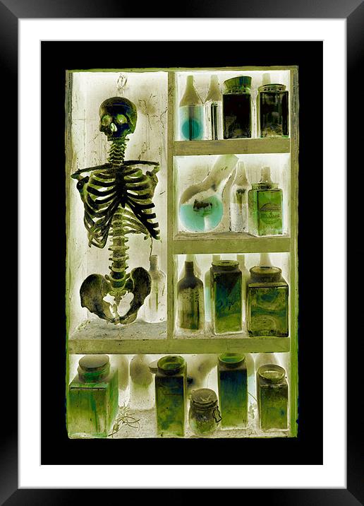 skeleton in the closet Framed Mounted Print by Heather Newton