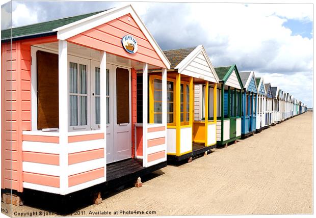  Colourfull Beach Huts at Southwold in Suffolk Canvas Print by john hartley