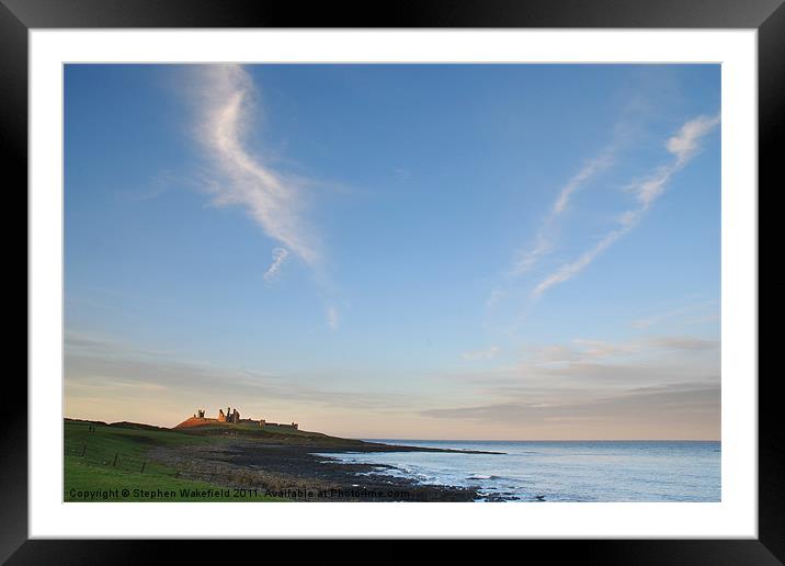 Towards Dunstanburgh castle at dusk Framed Mounted Print by Stephen Wakefield