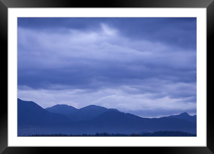 Moody sky at dawn Framed Mounted Print by Ian Middleton