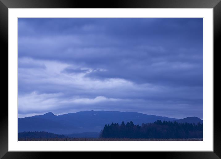 moody sky at dawn Framed Mounted Print by Ian Middleton