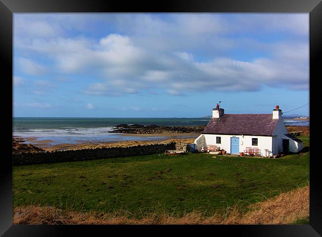 Cottage by the Sea Framed Print by Ian Tomkinson