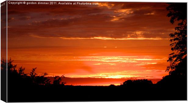 Sunset over Devon Canvas Print by Gordon Dimmer