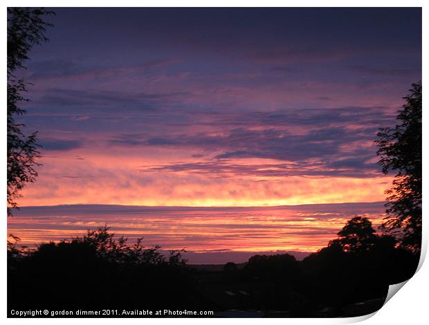 Multi coloured sunset in Devon Print by Gordon Dimmer