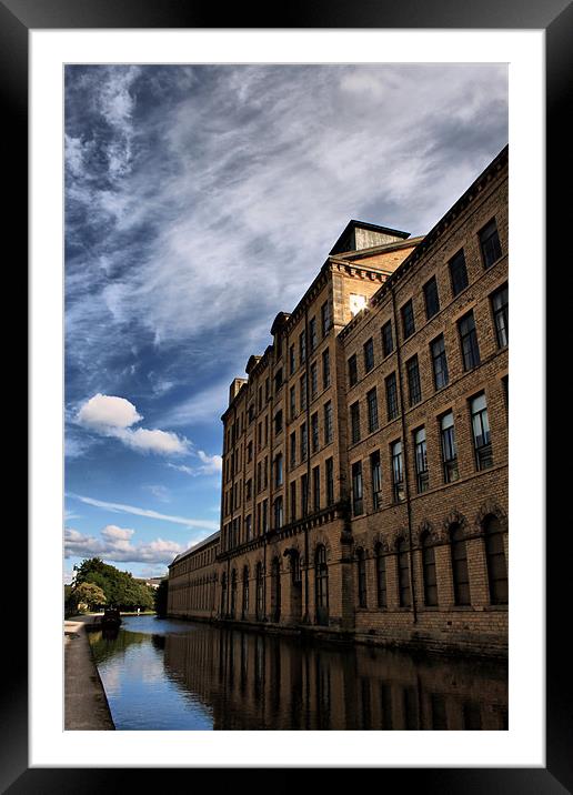 salts mill towering over leeds liverpool canal Framed Mounted Print by simon sugden