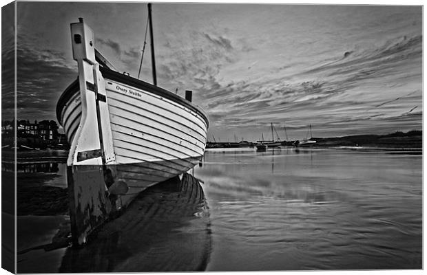 Stranded in Burham Overy Staithe Mono Canvas Print by Paul Macro
