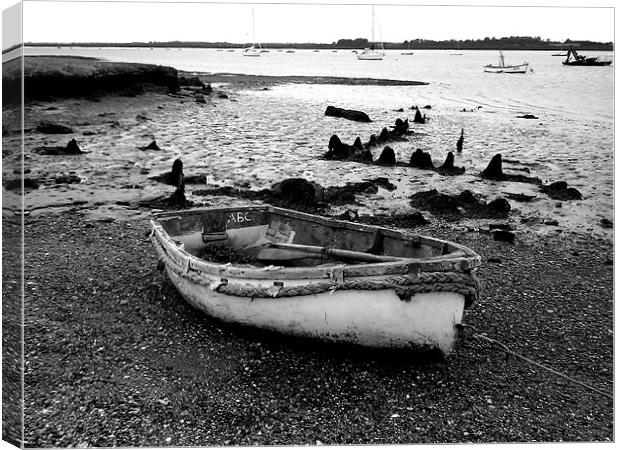 Rowing Boat at Orford Ness Canvas Print by justin rafftree