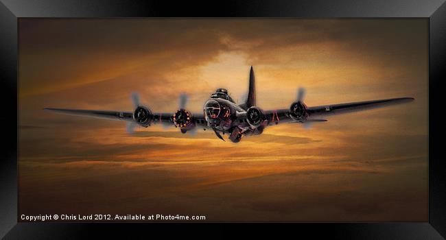 B17 Battle Scarred but Heading Home Framed Print by Chris Lord
